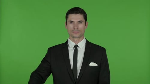 Young Businessman Showing Thumbs Down, Chroma Key
