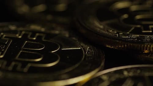 Rotating shot of Bitcoins (digital cryptocurrency) - BITCOIN 0570