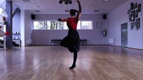 Elegant Woman Dancing in Dance Studio