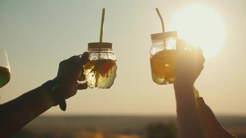 Refreshing Drinks at Sunset in the Countryside