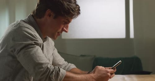 Caucasian man using his phone