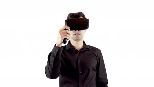Man Wearing Virtual Reality Goggles and Making His Choice with Beep Box