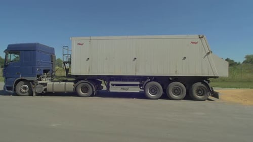 Loading truck driving in reverse