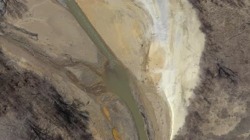 River coast polluted with mine drainage 4K aerial footage