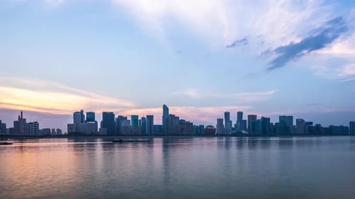 Timelapse of city skyline from day to night in hangzhou china