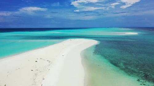 Aerial drone shot abstract of relaxing seashore beach time by blue water with white sandy background