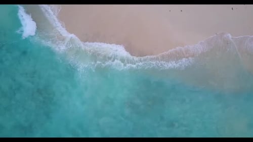 Aerial travel of relaxing coastline beach time by aqua blue sea with white sandy background of a day