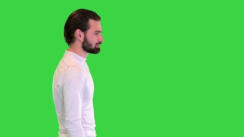 Walking Handsome Guy in Motion on a Green Screen Chroma Key