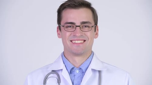 Smiling Doctor Wearing Glasses and White Coat
