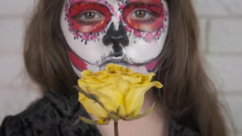 Day of the Dead Makeup With Yellow Rose