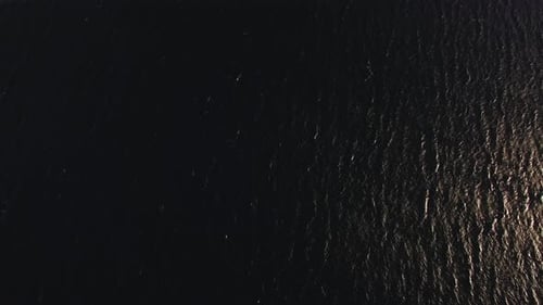 Aerial Shot of Sea and Trikorfo Beach Coastline with Houses, Greece