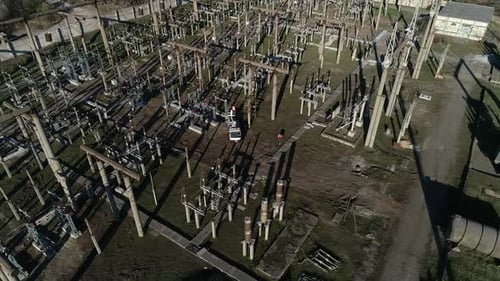 Lots of Metal Structures at a Power Station Power Lines and Transformers