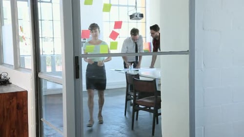 Young fashion designers working in studio