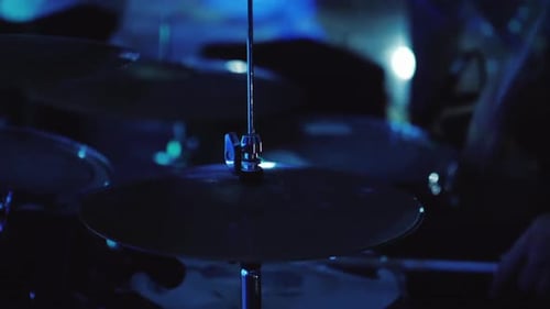 The Drummer Plays in a Nightclub