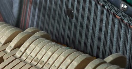 Piano Hammers Striking Strings Internal Macro Shot