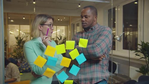 Diverse Entrepreneurs Working on Startup at Office