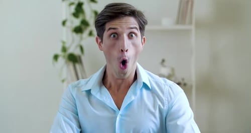 Portrait of Funny Young Attractive Man Wears Shirt, Surprised, Joyfully Dances From Good News. Close