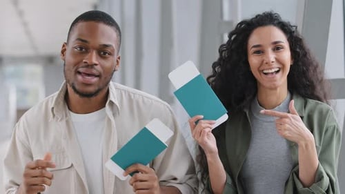 Multiracial Multiethnic Couple Newlyweds Afro American Man and Hispanic Woman Posing in Airport