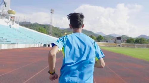 Athlete Running At Stadium