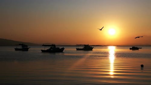 Sunset And Fishing Boats In Calm Sea 1
