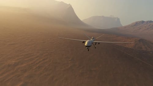 Advanced armed military drone (UAV) flying smoothly over a vast desert. 4K