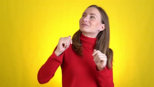 Young Woman Posing Isolated on Yellow Background Studio