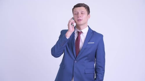 Young Adult Businessman Talking on Cell Phone