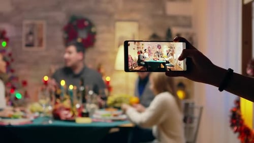 Festive Family Christmas Gathering Captured on Smartphone