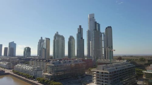Aerial establishing shot of skycrapers of Puerto Madero district of Buenos Aires city