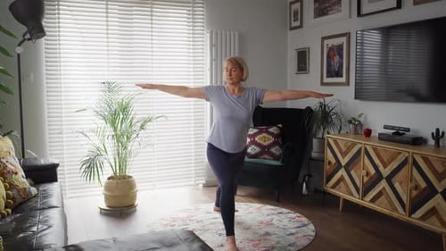 Woman Doing Yoga Exercise at Home