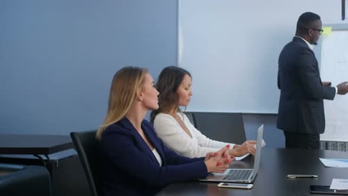 Business Presentation at a Conference Table