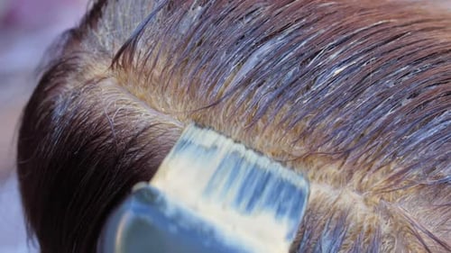 Hair Being Dyed Blonde at Roots
