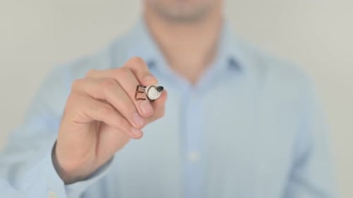 Hand Writing Economic Growth on Clear Surface