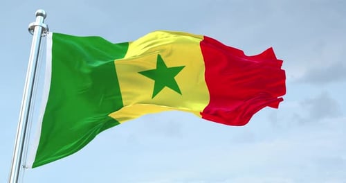 Realistic Senegal Flag Waving on Flagpole Against Blue Sky