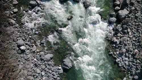 Drone Flying Down Colorful River
