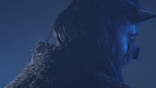 Demonic Pig-Masked Character in Moody Blue Lighting