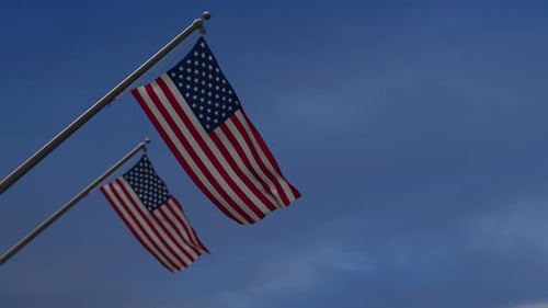 United States Of America Flags In The Blue Sky - 4K
