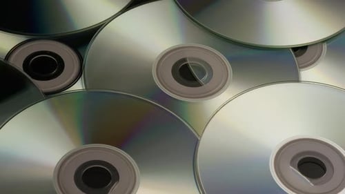 Close Up of Shiny Optical Discs Piled