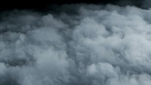Billowing White and Gray Smoke on Dark Background