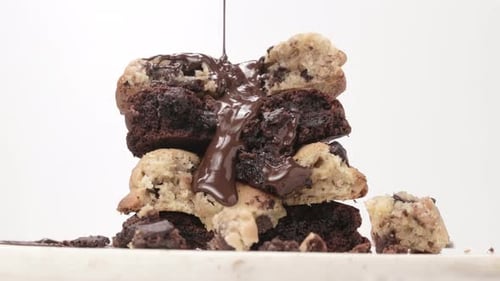 Tower of Chocolate Cookies Being Drizzled