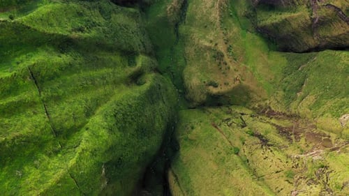 Epic Aerial View Over Hawaiian Coastal Landscape at a Sunset. Volcanic Rocks and Pacific Ocean