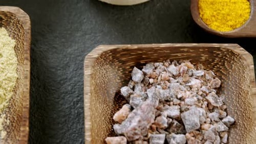 Bright Spices in Wooden Bowls, Close Up