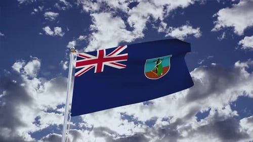 Montserrat Flag Waving Seamlessly Against Cloudy Blue Sky