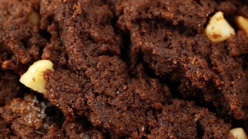 Slider close-up filming of chocolate chip cookies. Food biscuits close-up motion.