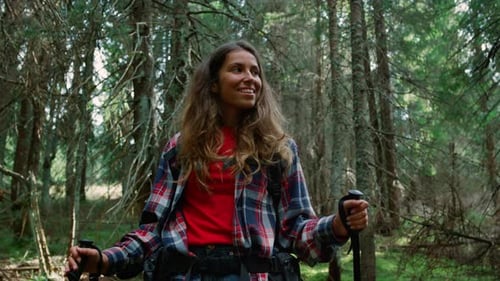 Active Woman Hiking in Forest
