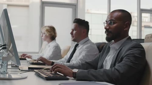 Multi-ethnic People Working In Office
