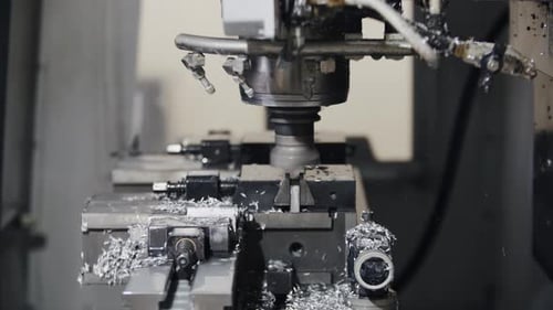 Automated Cnc Turning Lathe Machine Cutting Metal Part at Factory