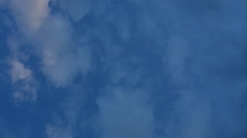 White Clouds Floating Across a Beautiful Blue Sky
