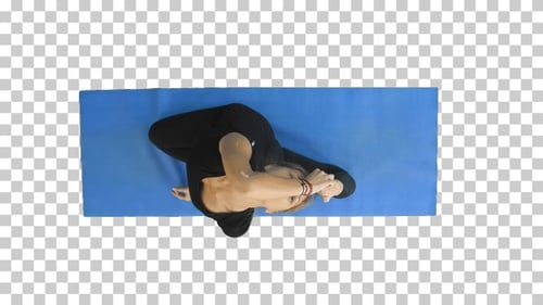 Healthy yoga woman does stretch on mat, Alpha Channel