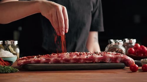 Woman Chef Cooking Ribs Closeup